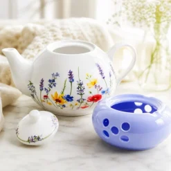 Dzbanek porcelanowy z niebieskim podgrzewaczem biały imbryk w kwiaty do zaparzania herbaty 1L ODELO SOLEY OD2963 Delhan